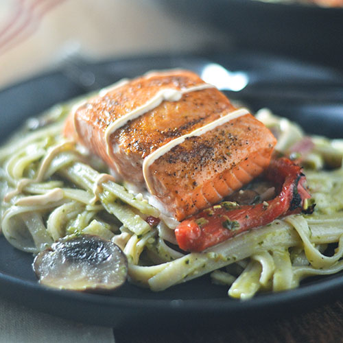 Salmon over Creamy Pesto GF Pasta #pasta #pesto #salmon #glutenfree | feedyoursoul2.com