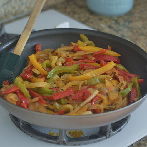 Sautéing of the Multi-Colored Peppers and Onions