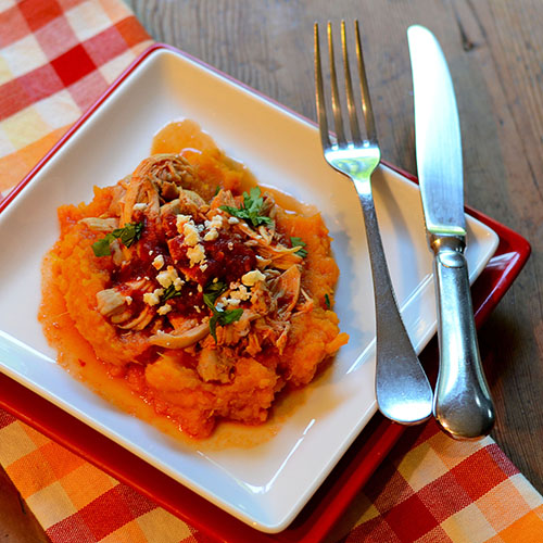Mexican Chicken with a Ancho pepper sauce on Sweet Potato Mash