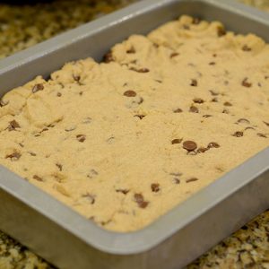 Vanilla Peanut Butter Chocolate Chip Cookie Bars Baked in pan 500