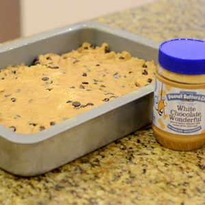 Vanilla Peanut Butter Chocolate Chip Cookie Bars In baking pan 500