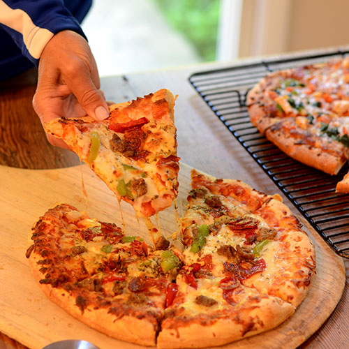 DiGiorno-Design-A-Pizza-Kit Aj holding 2 500