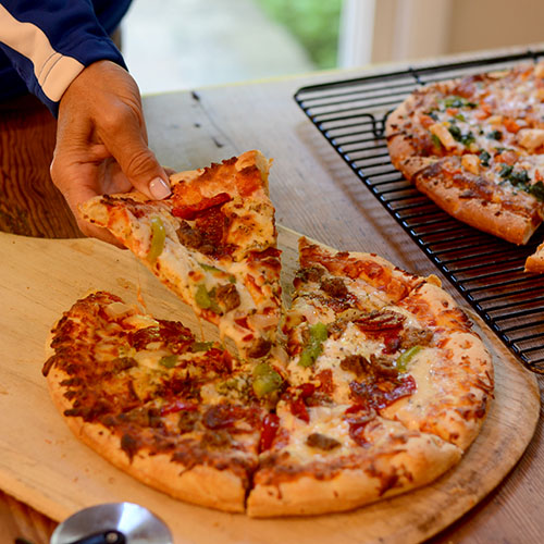 DiGiorno-Design-A-Pizza-Kit Aj holding 500