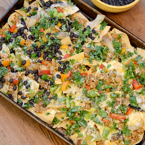 Everything-Nachos nachos, Mexican, cheese, ground turkey, black beans, peppers & cilantro