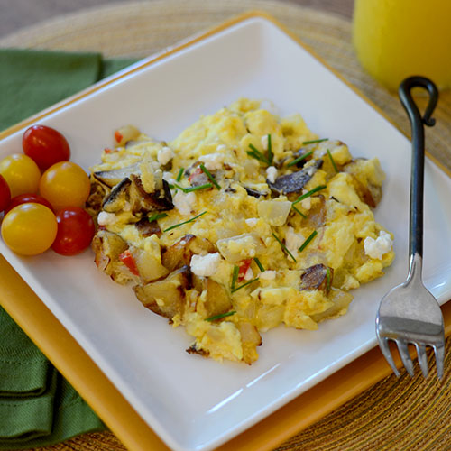 Goat-cheese-scrambled-eggs eggs, scrambled, onions, potatoes, jalapeno, cheese, goat cheese, salt, pepper