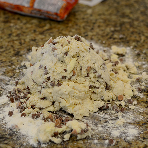 dough-on-lightly-floured-surface Dough, kneaded, floured surface, chips folded in