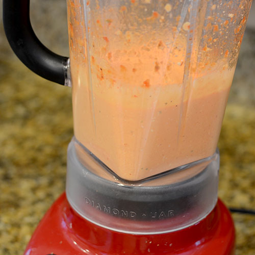ingredients-blended roasted red peppers, fat-free, greek yogurt, cream cheese, oregano, spices, lemon juice, olive oil