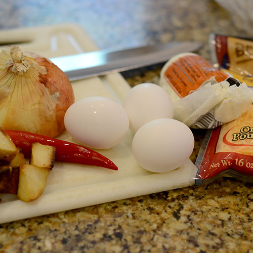 ingredients Ingredients, eggs, scrambled, onions, potatoes, jalapeno, cheese, goat cheese, salt, pepper
