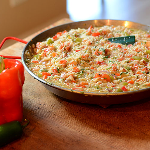 Green-Enchilada-Rice rice, mexican, peppers, onions, enchilada sauce, tomatoes, toasting