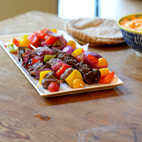 Greek-lamb-kabobs Greek Lamb Kabobs, lamb, peppers, onions, lemon, olive oil, tomatoes, kabobs, grilling
