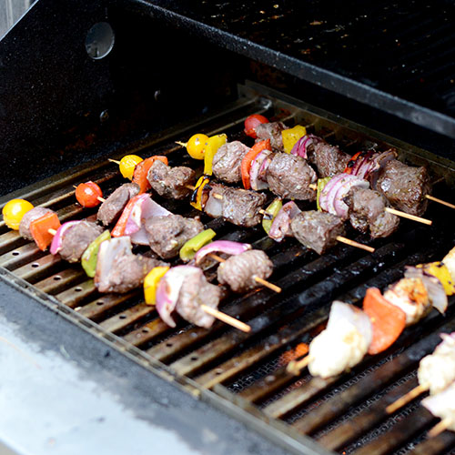 Greek-lamb-kabobs-on-grill Greek Lamb Kabobs, lamb, peppers, onions, lemon, olive oil, tomatoes, kabobs, grilling