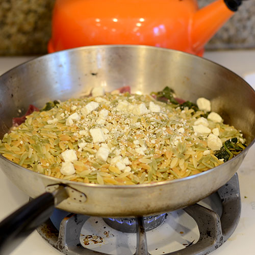 Orzo-added Orzo added, feta added, onions, herbs, garlic, spinach