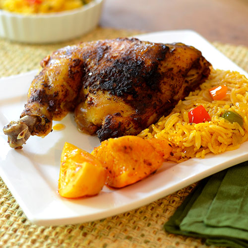 Mexican-Citrus-Chicken canola oil, orange juice, achiote, cumin, garlic, adobo, oregano, cayenne, red pepper flakes, lemon juice, chicken, peppers, oranges, lemons
