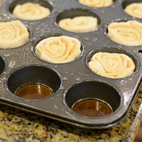 maple-syrup-and-muffins-added-to-tin milk,vegetable oil, dry yeast, all-purpose flour, baking powder, baking soda, cinnamon, sugar, sugar, milk, butter, coffee, salt, maple extract