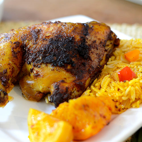 mexican-citrus-chicken canola oil, orange juice, achiote, cumin, garlic, adobo, oregano, cayenne, red pepper flakes, lemon juice, chicken, peppers, oranges, lemons