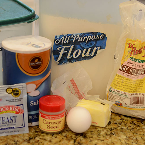 Ingredients yeast, rye flour, all-purpose flour, caraway seed, egg, butter, salt, sugar
