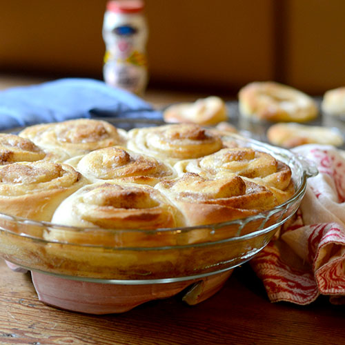 Cinnamon-Glazed-Muffins milk,vegetable oil, dry yeast, all-purpose flour, baking powder, baking soda, cinnamon, sugar, sugar, milk, butter, coffee, salt, maple extract