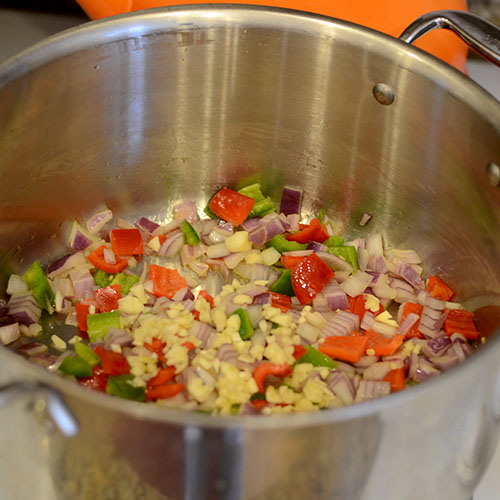 vegetables-in-pot Vegetables in pot, red onion, peppers, garlic,