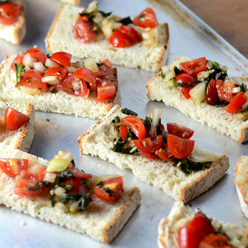 Bruschetta Bruschetta, tomatoes, herbs, basil, onions, olive oil, salt, pepper, garlic