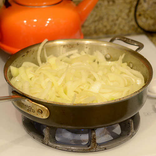 Onions-Added-to-Pan Onions Added to Pan