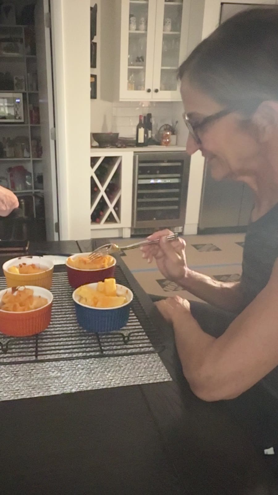 Blind taste test of four mac and cheese dishes in colored ramekins