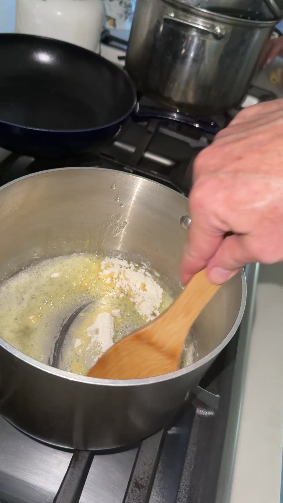 Butter and flour roux cooking in a saucepan